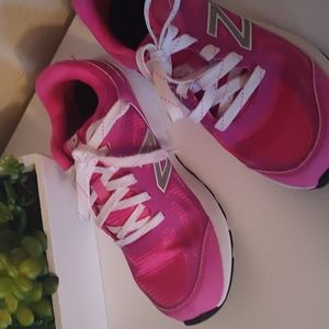 New balance Pink running shoe for girls.